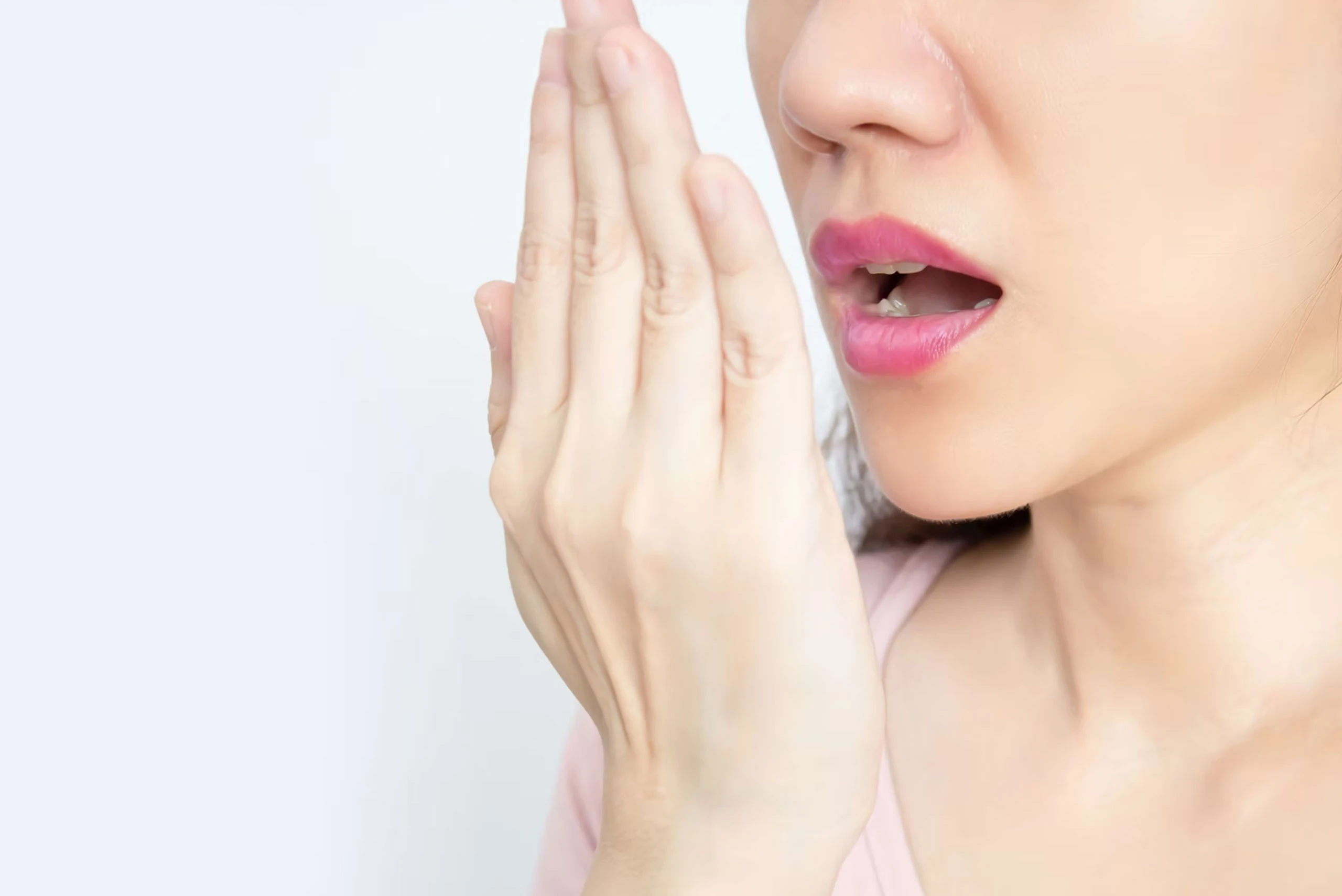 Woman demonstrating the importance of oral hygiene